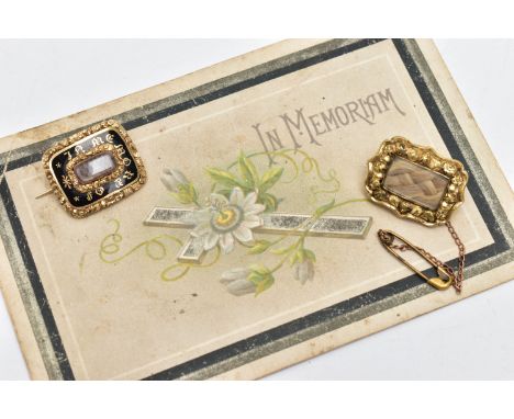 TWO EARLY 20TH CENTURY MEMORIAL BROOCHES, the first a gold brooch, rectangular form, a central glass panel with plaited hair 