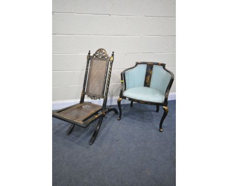 A 19TH CENTURY EBONISED JAPANNED ARMCHAIR, with chinoiserie detail, on cabriole front legs, along with a 19th century ebonise