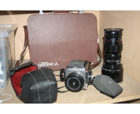 A ZENZA BRONICA S MEDIUM FORMAT CAMERA with leather case fitted with a Nikkor-P 7.5cm f2.8 lens and a boxed detachable hood ,