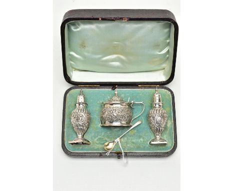 A CASED LATE VICTORIAN FOUR PIECE SILVER CRUET SET, comprising a pair of baluster pepperettes with pull off covers, covered m