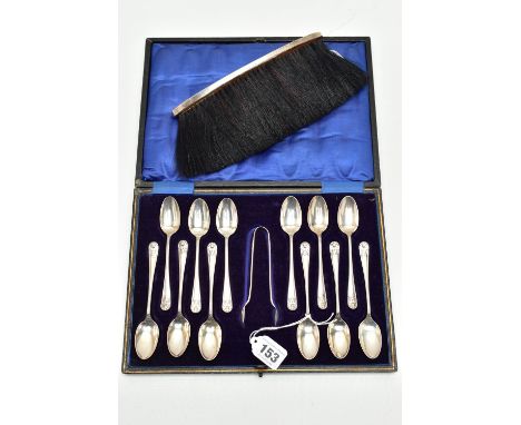 A CASED SET OF TWELVE GEORGE V SILVER TEASPOONS AND MATCHING SUGAR TONGS, foliate design to the handles, makers James Deakin 