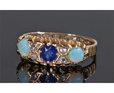 18 carat gold opal, sapphire and diamond ring, the central sapphire flanked by two pairs of diamonds and opals to each size, 