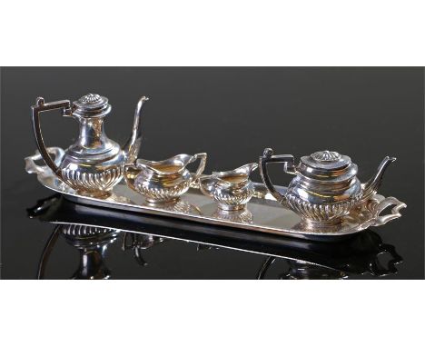 Elizabeth II miniature silver tea set, Birmingham 1974, maker W.A. to include a long tray, coffee and tea pot, sugar bowl and