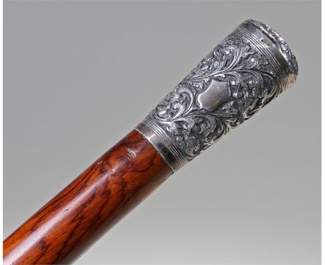 19th Century walking stick, of substantial proportions with a white metal top. 97cm high 