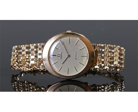 Omega De Ville 9 carat gold gentlemans wristwatch, circa 1970. The signed champagne dial with baton hours, later 9 carat gold