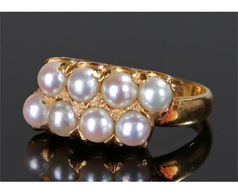 Chinese gold and pearl set ring, with two rows of four pearls to each row, ring size K 1/2