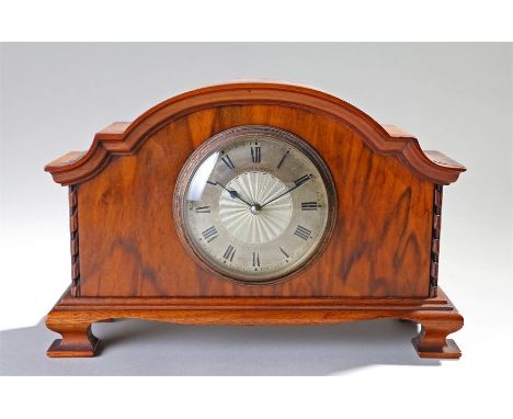 Early 20th Century walnut mantel clock, Mappin & Webb, the arched case with quarter columns, ogee bracket feet, the silvered 