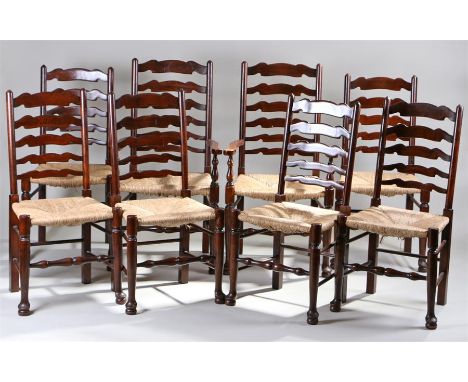 Set of eight 18th Century style ladder back chairs, the arched slat backs above rush seats and turned legs, to include two ca