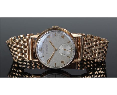 Longines 9 carat gold gentleman's wristwatch, the silvered signed dial with subsidiary seconds dial, Arabic and baton hours, 