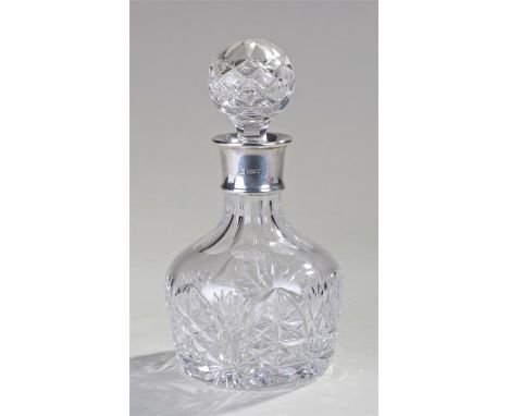 Elizabeth II silver collared cut glass decanter, Birmingham 1992, maker Barker Ellis Silver Company, the cut glass stopper an