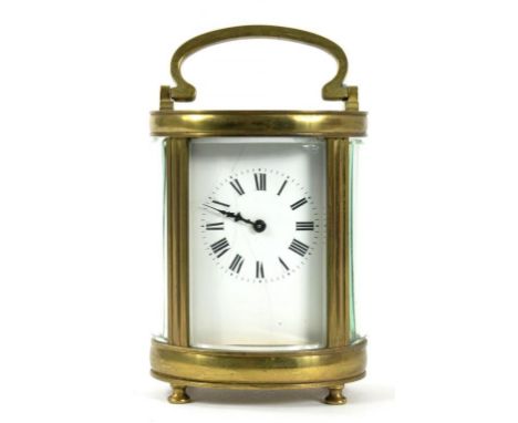 A FRENCH BRASS OVAL CARRIAGE CLOCK, WITH ENAMEL DIAL, THE TIMEPIECE WITH REPLACEMENT PLATFORM LEVER ESCAPEMENT, 12CM EXCLUDIN
