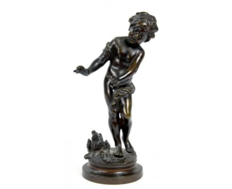 A FRENCH BRONZE STATUETTE OF A CHILD WARMING HIMSELF BESIDE A FIRE, CAST FROM A MODEL BY A. MOREAU, 20CM H, LATE 19TH CENTURY