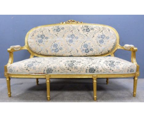Louis XVI style upholstered gilt framed sofa on turned tapering legs, 156cm wide.     