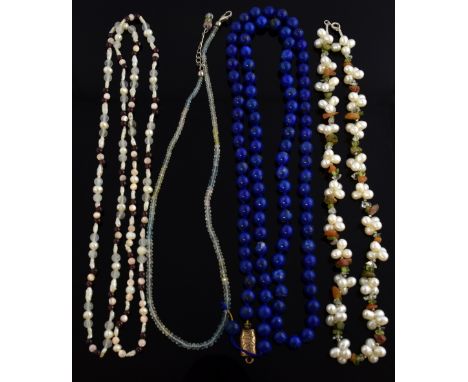  Four necklaces one Lapis lazuli with gold clasp tested as 9 ct , pearl and gem necklace, pearl and garnet necklace and aquam