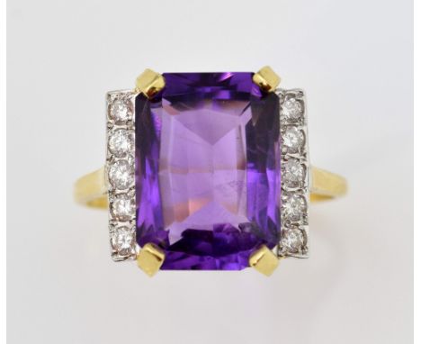 Amethyst and diamond dress ring, set with an amethyst of approximately, 6.00 carats with diamond set shoulders, 18 ct white a