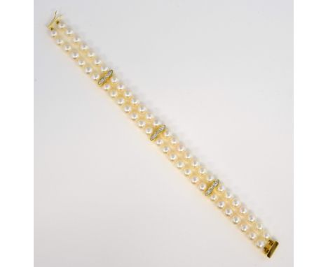 Cultured pearl bracelet with diamond set bars, eighteen round brilliant cut diamonds, mounted in 18ct yellow gold, with 6mm w