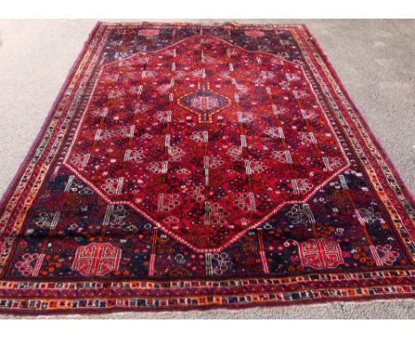 Persian Blue Ground Carpet, multiple borders, centre with repeating foliate forms, 222 x 300 cm .     