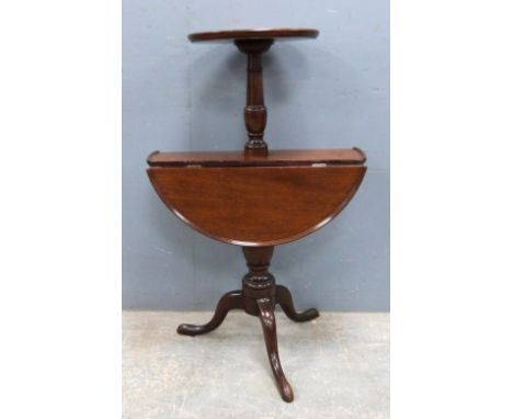 19th century mahogany two tier dumb waiter, the lower tier with drop sides, on turned column, tripod base and pad feet, 92.5c