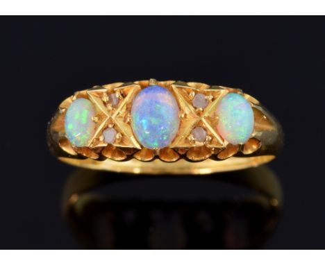 Victorian opal and diamond ring in carved setting,18 ct gold, Birmingham 1901, ring size K  .     Gross weight 2.8 grams