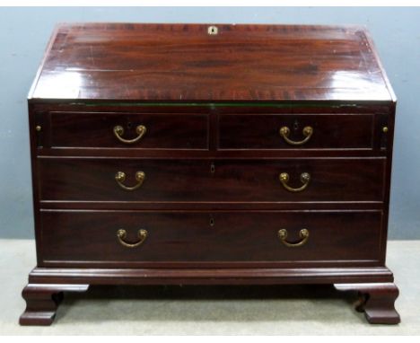 19th century mahogany bureau with fall flap enclosing pigeon holes and drawers, on two short and two long drawers on ogee bra