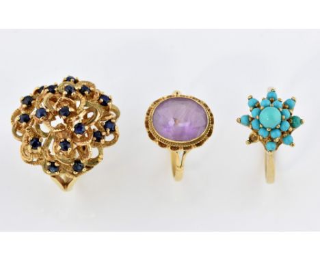 Three gold rings, a sapphire set cluster ring, another set with turquoise,  and an cabochon, amethyst ring, all mounted in ye