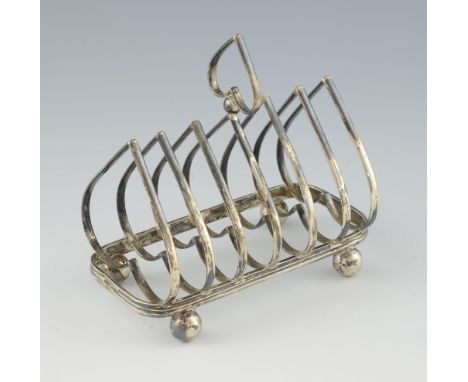 Victorian silver six division toast rack of inverted heart form on four ball feet, by Roberts & Belk, Sheffield, 1898, 8.8oz,
