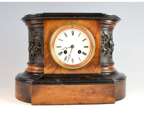 Walnut and ebonised mantle clock the two train movement by Japy Frères, 24cn high, 30cm wide, 15cm deep.     
