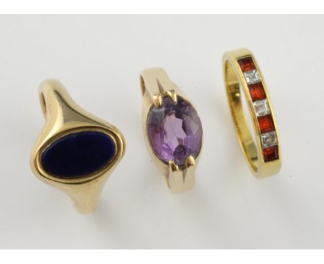 Three rings, diamond and red glass channel set ring, mounted in 18ct yellow gold, ring size O, with amethyst ring, set in 9ct