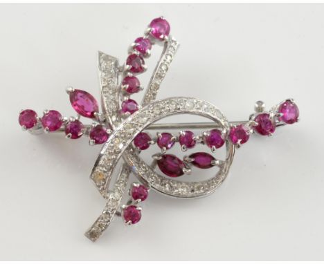 Vintage 1970's ruby and diamond brooch, looped ribbon motif set with Swiss cut diamonds, intersected with round cut and marqu