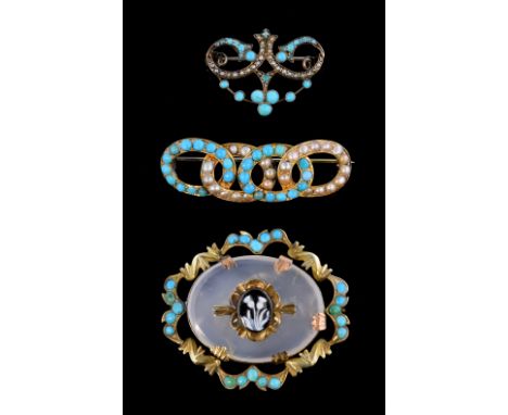 Three antique turquoise brooches including a gold and turquoise brooch with a carved hardstone thistle cameo to the centre ot