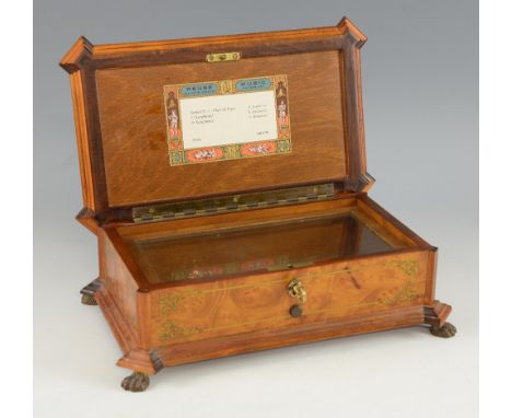Reuge Sainte-Croix music box, playing three airs by Beethoven, numbered 37216 and CH 3/72, in a burr walnut and brass inlaid 
