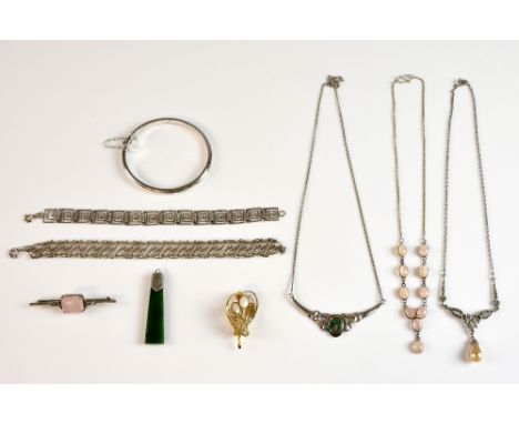 Collection of mostly silver jewellery including a bangle, two bracelets, a rose quartz set necklace and other items .     Gro