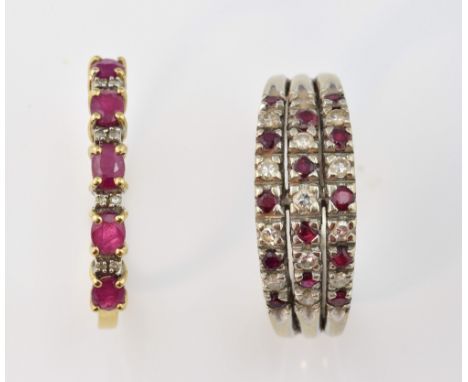 Two ruby and diamond dress rings, one set with five oval cut rubies and eight Swiss cut diamonds, set in yellow metal stamped