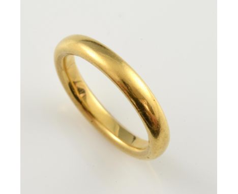 Gold  wedding band, 22 ct, measuring 3.2mm wide, hallmarked Birmingham 1929, ring size K 1/2 .     Gross weight 5.8 grams