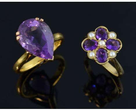 Two amethyst set rings, the pear shape amethyst ring mounted in 22ct gold and the amethyst and pearl cluster marked 375, ring
