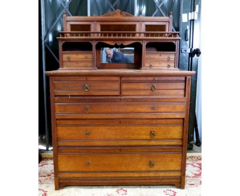 Gillows & Co of Lancaster walnut chest, superstructure with galleried shelf, open section drawer and mirror to base with two 