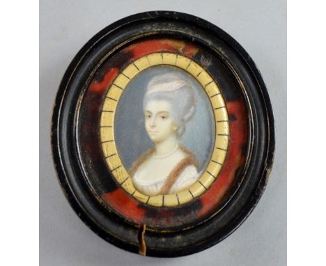 19th Century portrait miniature of a woman in a fur stole  - 5 x 4 cm .     