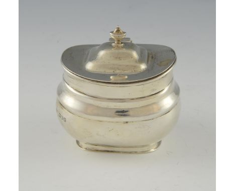 Edward VII silver oval tea caddy, the hinged cover with urn finial, London 1910, 11 cms high, 138 grms, .     