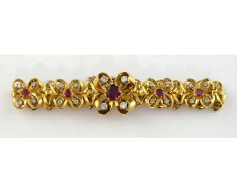 Vintage 1960's ruby and diamond bracelet, central larger link with oval cut ruby, estimated weight 0.87 carat, surrounded by 