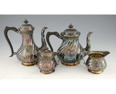 Modern silver four piece tea and coffee service, comprising coffee pot, tea pot, cream jug and sugar bowl with spiral form bo