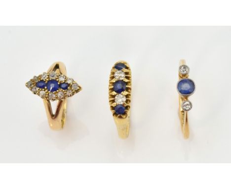 Three sapphire and diamond rings, Edwardian ring with central sapphire set in between two old cut diamonds, ring size K 1/2, 