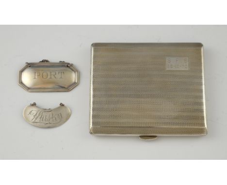 Modern silver cigarette case with engine turned decoration, by Joseph Gloster Ltd., Birmingham, 1966, and two decanter labels