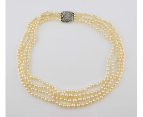 Four strand pearl necklace with diamond clasp, graduated white round pearls, measuring from 3mm to 7.5mm in diameter and 41 c
