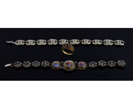 Continental plaque bracelet, the mother of pearl plaques painted with figures in a rural landscape with cut steel border and 