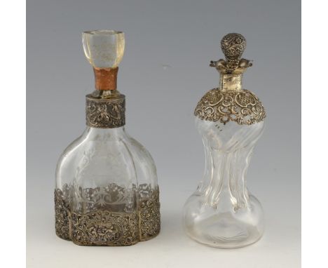 Dutch silver mounted etched glass decanter, the silver mount with pierced scrolling decoration and a tavern scene, 27cm high,