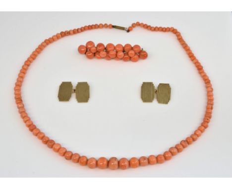 Victorian coral bead necklace to a barrel clasp, 44 cm, a matching brooch and a pair of 9ct gold cuff links with engine turne