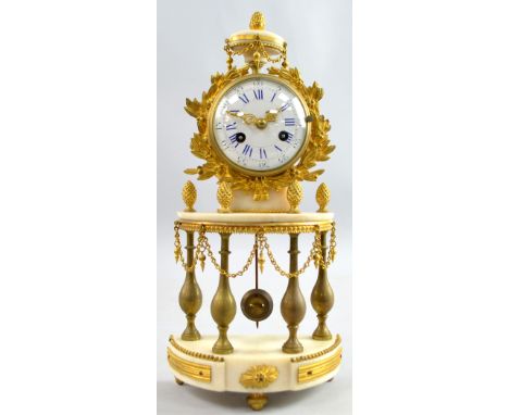 Early 20th century French brass, white marble and gilt metal mantel clock, the white enamelled dial with twin train movement,