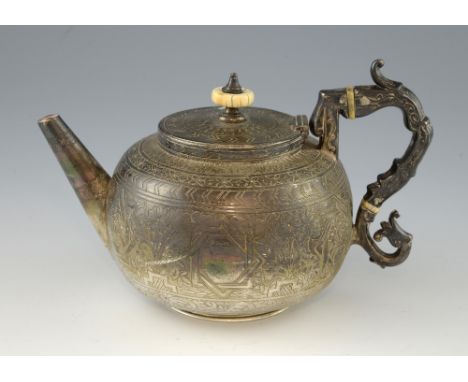 Victorian silver tea pot engraved throughout with floral and geometric patterns, on round foot, by W & G Sissons, London, 188