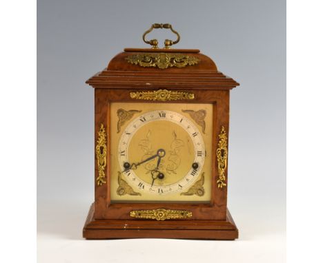 Early 20th Century walnut cased eight day mantel clock by Elliott, brass dial and brass spandrels, 33cm .     Case is dirty, 