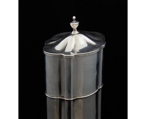 George V silver serpentine shaped tea caddy the hinged cover with urn finial, Birmingham 1912, 8 cms x 8 cms high, 89 grms.  